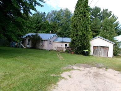 3 BD Home in Village of Farwell within walking distance of on Eagle Glen Golf Course in Michigan - for sale on GolfHomes.com, golf home, golf lot