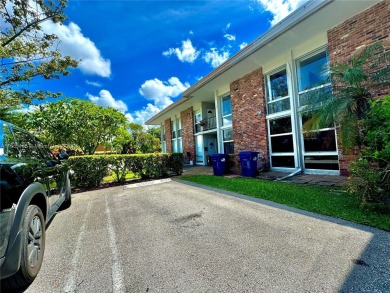 Seller is offering $10,000 towards buyer's closing costs with an on Country Club of Miami in Florida - for sale on GolfHomes.com, golf home, golf lot