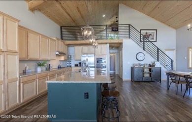 Discover elevated mountain living in this stunning 6-bedroom on Star Valley RV Golf Course in Wyoming - for sale on GolfHomes.com, golf home, golf lot