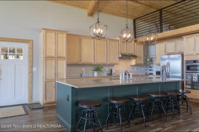 Discover elevated mountain living in this stunning 6-bedroom on Star Valley RV Golf Course in Wyoming - for sale on GolfHomes.com, golf home, golf lot