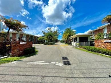 Seller is offering $10,000 towards buyer's closing costs with an on Country Club of Miami in Florida - for sale on GolfHomes.com, golf home, golf lot