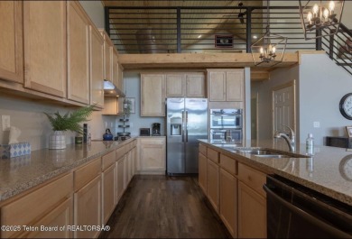 Discover elevated mountain living in this stunning 6-bedroom on Star Valley RV Golf Course in Wyoming - for sale on GolfHomes.com, golf home, golf lot