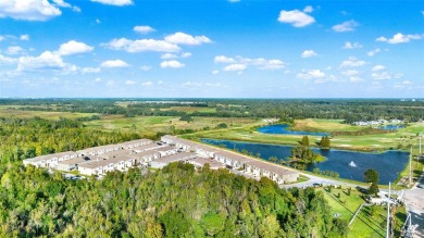 Welcome to this nearly brand-new waterfront townhouse located in on Ridgewood Lakes Golf and Country Club in Florida - for sale on GolfHomes.com, golf home, golf lot