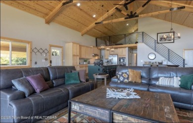 Discover elevated mountain living in this stunning 6-bedroom on Star Valley RV Golf Course in Wyoming - for sale on GolfHomes.com, golf home, golf lot