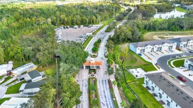 Welcome to this nearly brand-new waterfront townhouse located in on Ridgewood Lakes Golf and Country Club in Florida - for sale on GolfHomes.com, golf home, golf lot