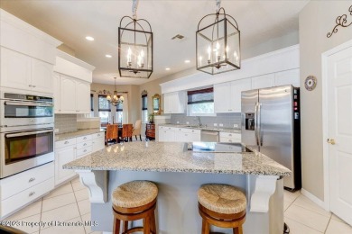 Paradise calls - will you be the one who answers? An exquisite on Silverthorn Country Club in Florida - for sale on GolfHomes.com, golf home, golf lot