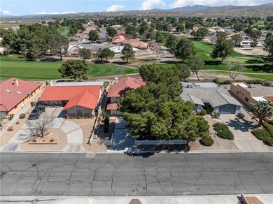 This 1987 built 2,032 sq ft home offers a common room with an on Silver Lakes Golf Course in California - for sale on GolfHomes.com, golf home, golf lot