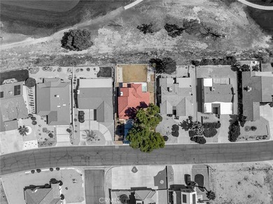 This 1987 built 2,032 sq ft home offers a common room with an on Silver Lakes Golf Course in California - for sale on GolfHomes.com, golf home, golf lot