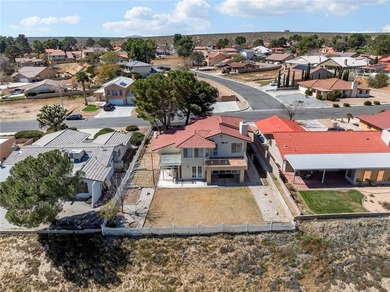 This 1987 built 2,032 sq ft home offers a common room with an on Silver Lakes Golf Course in California - for sale on GolfHomes.com, golf home, golf lot