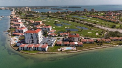 Under contract-accepting backup offers. Waterviews and golf on Isla Del Sol Yacht and Country Club in Florida - for sale on GolfHomes.com, golf home, golf lot