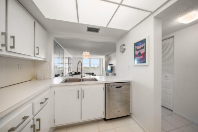 Under contract-accepting backup offers. Waterviews and golf on Isla Del Sol Yacht and Country Club in Florida - for sale on GolfHomes.com, golf home, golf lot