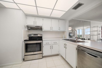 Under contract-accepting backup offers. Waterviews and golf on Isla Del Sol Yacht and Country Club in Florida - for sale on GolfHomes.com, golf home, golf lot