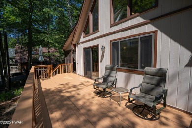 Cozy up in style in this beautifully maintained Poconos chalet on The Hideout Golf in Pennsylvania - for sale on GolfHomes.com, golf home, golf lot
