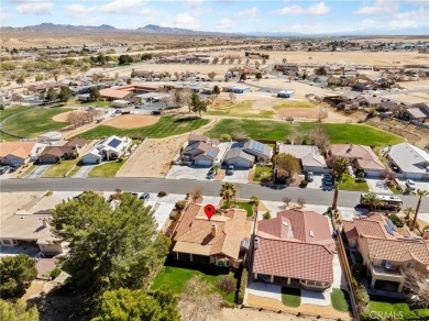 Welcome to 14996 Shady Elm, a warm and inviting 3-bedroom on Silver Lakes Golf Course in California - for sale on GolfHomes.com, golf home, golf lot