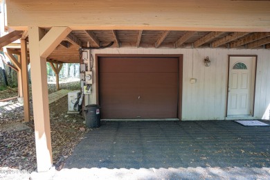Cozy up in style in this beautifully maintained Poconos chalet on The Hideout Golf in Pennsylvania - for sale on GolfHomes.com, golf home, golf lot