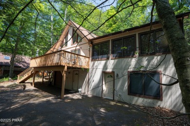 Cozy up in style in this beautifully maintained Poconos chalet on The Hideout Golf in Pennsylvania - for sale on GolfHomes.com, golf home, golf lot