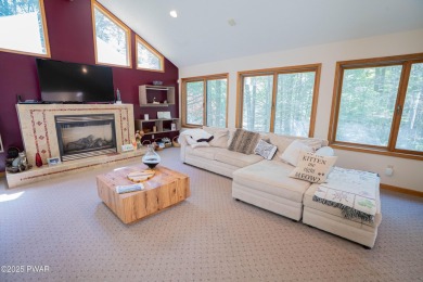 Cozy up in style in this beautifully maintained Poconos chalet on The Hideout Golf in Pennsylvania - for sale on GolfHomes.com, golf home, golf lot