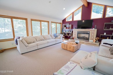 Cozy up in style in this beautifully maintained Poconos chalet on The Hideout Golf in Pennsylvania - for sale on GolfHomes.com, golf home, golf lot