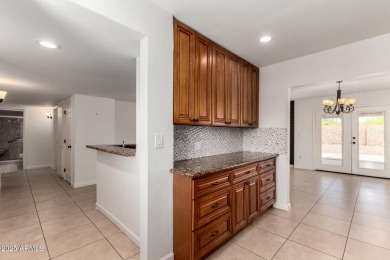 Welcome to the comfort and convenience of this charming on Leisure World Country Club in Arizona - for sale on GolfHomes.com, golf home, golf lot