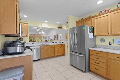 This charming 3/2 WISTERIA model is in the much sought-after on Glenview Championship Golf and Country Club in Florida - for sale on GolfHomes.com, golf home, golf lot