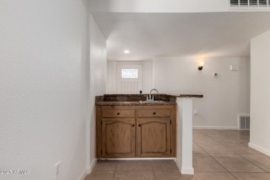 Welcome to the comfort and convenience of this charming on Leisure World Country Club in Arizona - for sale on GolfHomes.com, golf home, golf lot