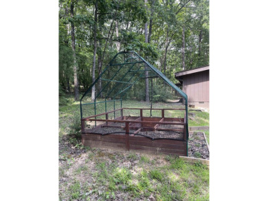 What a unique property on a large, corner lot (3 lots replatted on Indian Hills Country Club in Arkansas - for sale on GolfHomes.com, golf home, golf lot
