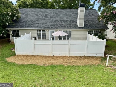 This beautifully renovated ranch-style home is situated in a on Summergrove Golf Club in Georgia - for sale on GolfHomes.com, golf home, golf lot