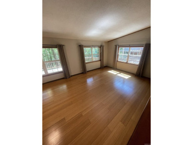 What a unique property on a large, corner lot (3 lots replatted on Indian Hills Country Club in Arkansas - for sale on GolfHomes.com, golf home, golf lot