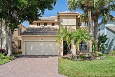 STUNNING 3-bed + bonus loft home in Jensen Beach Country Club on Eagle Marsh Golf Club in Florida - for sale on GolfHomes.com, golf home, golf lot