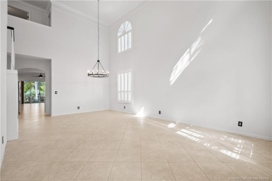 STUNNING 3-bed + bonus loft home in Jensen Beach Country Club on Eagle Marsh Golf Club in Florida - for sale on GolfHomes.com, golf home, golf lot