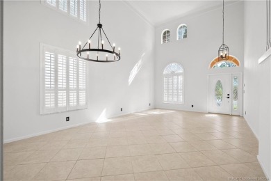 STUNNING 3-bed + bonus loft home in Jensen Beach Country Club on Eagle Marsh Golf Club in Florida - for sale on GolfHomes.com, golf home, golf lot