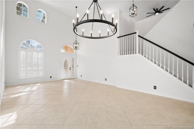 STUNNING 3-bed + bonus loft home in Jensen Beach Country Club on Eagle Marsh Golf Club in Florida - for sale on GolfHomes.com, golf home, golf lot