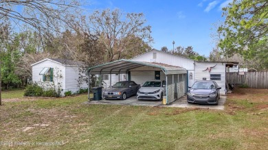 Welcome to this car enthusiasts perfect retreat!! This fantastic on Scotland Yards Golf Club in Florida - for sale on GolfHomes.com, golf home, golf lot