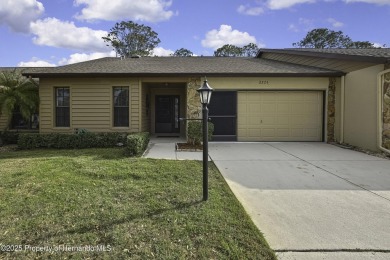This charming villa, located on the first hole of the Grand on Timber Pines Golf Course in Florida - for sale on GolfHomes.com, golf home, golf lot