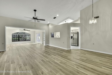 This charming villa, located on the first hole of the Grand on Timber Pines Golf Course in Florida - for sale on GolfHomes.com, golf home, golf lot