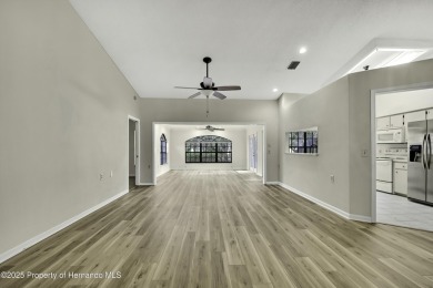 This charming villa, located on the first hole of the Grand on Timber Pines Golf Course in Florida - for sale on GolfHomes.com, golf home, golf lot
