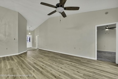 This charming villa, located on the first hole of the Grand on Timber Pines Golf Course in Florida - for sale on GolfHomes.com, golf home, golf lot