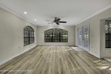 This charming villa, located on the first hole of the Grand on Timber Pines Golf Course in Florida - for sale on GolfHomes.com, golf home, golf lot