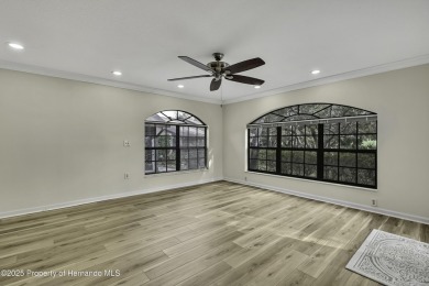 This charming villa, located on the first hole of the Grand on Timber Pines Golf Course in Florida - for sale on GolfHomes.com, golf home, golf lot