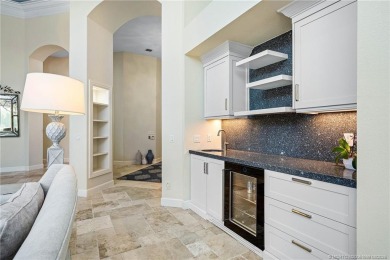 Experience unparalleled resort style living in this elegant on Sailfish Point Golf Club, Inc. in Florida - for sale on GolfHomes.com, golf home, golf lot
