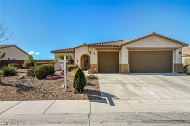 Welcome to this beautifully designed 3-bedroom, 2-bath home with on Mountain Falls Golf Course in Nevada - for sale on GolfHomes.com, golf home, golf lot