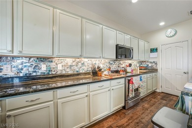 Welcome to this beautifully designed 3-bedroom, 2-bath home with on Mountain Falls Golf Course in Nevada - for sale on GolfHomes.com, golf home, golf lot