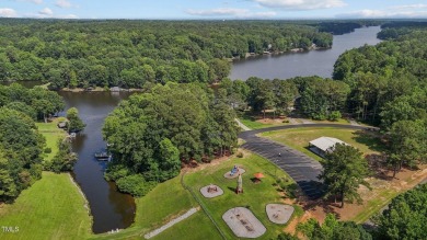 WALK  TO PONTIAC MARINA FROM THIS CHARMING RANCH !! Rocketship on River Golf and County Club at Lake Royale in North Carolina - for sale on GolfHomes.com, golf home, golf lot