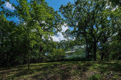 As you arrive at 4720 W. Longhollow, you find yourself in a on Eagle Ridge Inn and Resort in Illinois - for sale on GolfHomes.com, golf home, golf lot