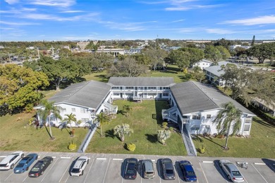 Enjoy peaceful living in this spacious 1-bedroom, 1.5-bath on Hillsboro Pines Golf in Florida - for sale on GolfHomes.com, golf home, golf lot