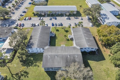 Enjoy peaceful living in this spacious 1-bedroom, 1.5-bath on Hillsboro Pines Golf in Florida - for sale on GolfHomes.com, golf home, golf lot