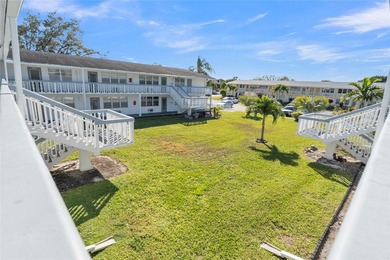 Enjoy peaceful living in this spacious 1-bedroom, 1.5-bath on Hillsboro Pines Golf in Florida - for sale on GolfHomes.com, golf home, golf lot
