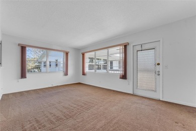 Enjoy peaceful living in this spacious 1-bedroom, 1.5-bath on Hillsboro Pines Golf in Florida - for sale on GolfHomes.com, golf home, golf lot