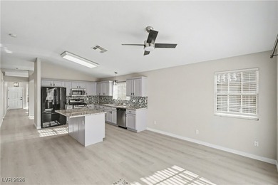 This beautifully updated single-story home offers 3 spacious on Los Prados Golf Course in Nevada - for sale on GolfHomes.com, golf home, golf lot