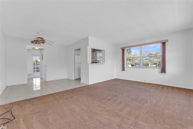 Enjoy peaceful living in this spacious 1-bedroom, 1.5-bath on Hillsboro Pines Golf in Florida - for sale on GolfHomes.com, golf home, golf lot